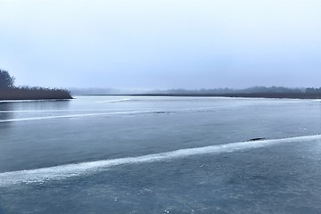 Image showing Skating on a lake