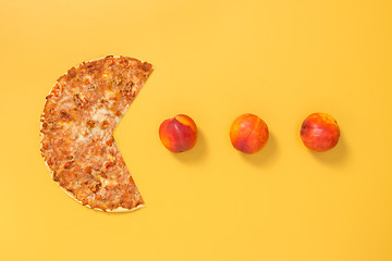 Image showing Hungry pizza hunting for fresh peaches