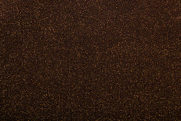 Image showing Texture of golden metallic threads in black fabric