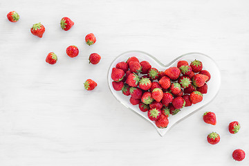 Image showing Strawberries in a heart-shaped bowl