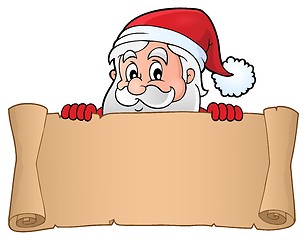 Image showing Lurking Santa Claus holding parchment 3