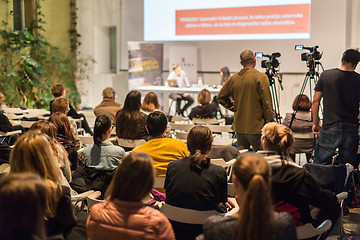 Image showing Media interview and round table discussion at popular scientific conference.