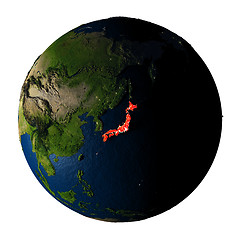 Image showing Japan in red on Earth isolated on white