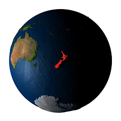 Image showing New Zealand in red on Earth isolated on white