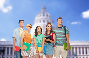 Image showing students with books over american white house