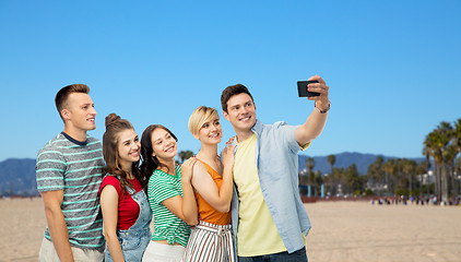 Image showing friends taking selfie over venice beach