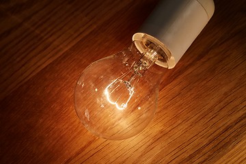 Image showing Light bulb on a table