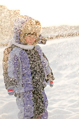 Image showing Boy enjoying the first snow