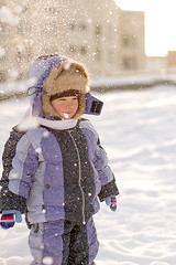 Image showing Boy enjoying the first snow