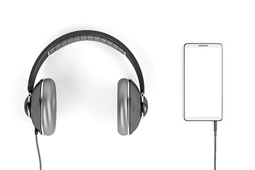 Image showing Big headphones and smartphone on white background