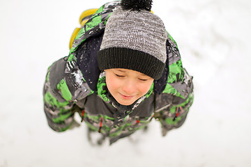 Image showing Boy enjoying the first snow