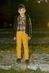 Image showing Stylish boy standing in autumn park