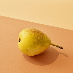 Image showing pear with long shadow