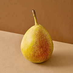 Image showing fresh pear on brown background