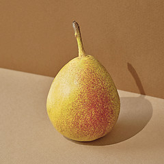 Image showing pear with long shadow