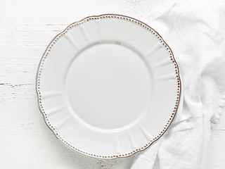 Image showing white plate on wooden table