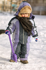 Image showing Boy enjoying the first snow