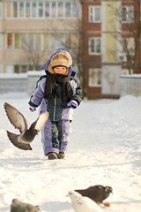 Image showing Boy enjoying the first snow