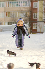 Image showing Boy enjoying the first snow