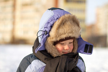 Image showing Boy enjoying the first snow