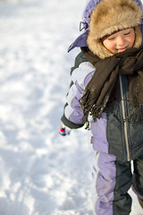 Image showing Boy enjoying the first snow