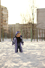 Image showing Boy enjoying the first snow