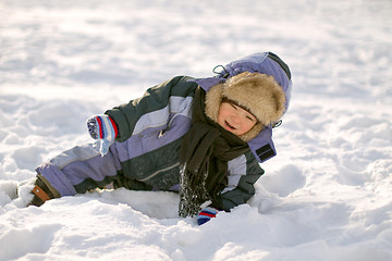 Image showing Boy enjoying the first snow