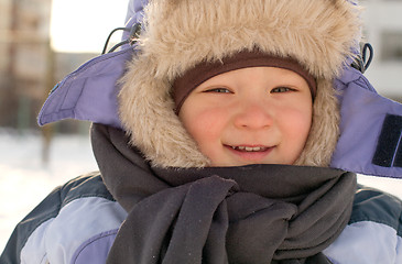 Image showing Boy enjoying the first snow