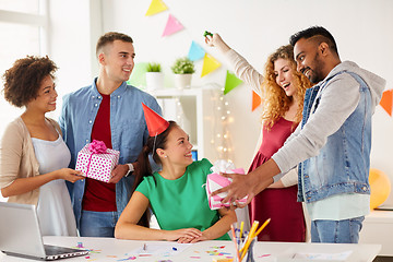 Image showing team greeting colleague at office birthday party