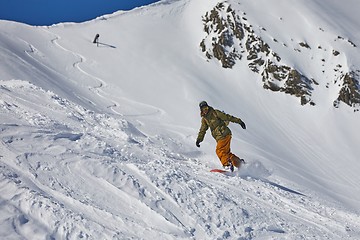Image showing Snowboarder in the Alps