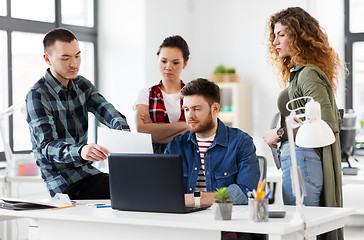 Image showing creative team with laptop working at office