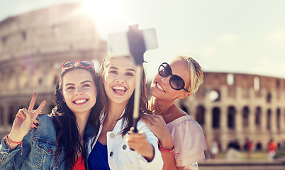 Image showing group of smiling women taking selfie in rome