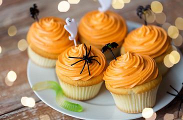 Image showing halloween party decorated cupcakes on plate