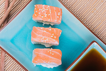 Image showing Top view to california maki sushi with salmon