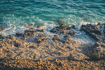 Image showing Rocky beach, blue sea