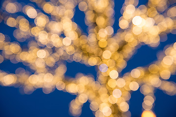 Image showing Blurred golden lights Christmas Tree