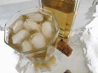Image showing Glass of Alcohol with bottle and cork
