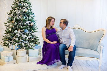 Image showing Family portrait near christmas tree