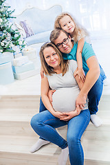 Image showing Family portrait near christmas tree