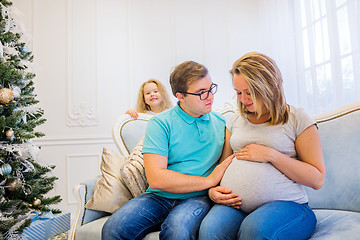 Image showing Family portrait near christmas tree