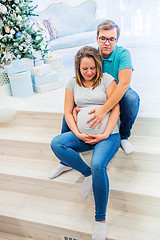 Image showing Family portrait near christmas tree