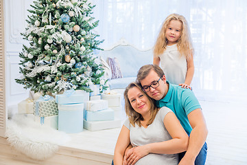 Image showing Family portrait near christmas tree