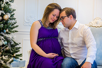 Image showing Family portrait near christmas tree