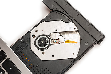 Image showing Open optical CD/DVD disc drive on a notebook.