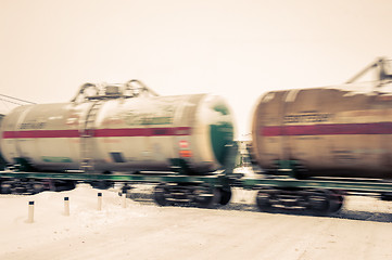 Image showing Train with oil tanks moving.