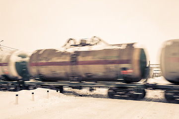 Image showing Train with oil tanks moving.