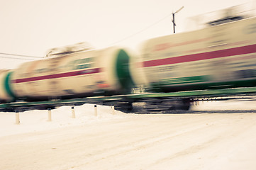 Image showing Train with oil tanks moving.