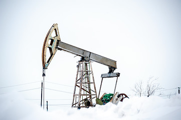 Image showing Pump Jack on a oilfield.