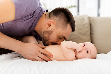 Image showing close up of father with little baby at home