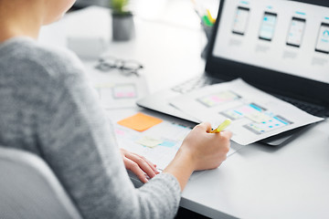 Image showing web designer working on user interface at office